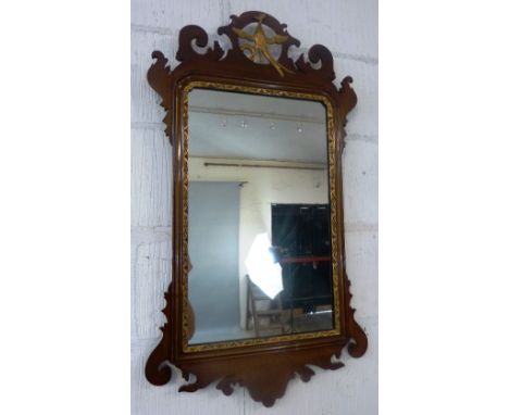 A Chippendale style mahogany fretwork wall mirror, with gilded ho-ho bird to the top over an oblong panel with gilded carved 