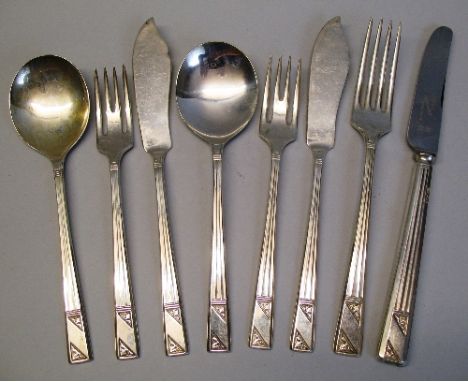 Eight pieces of matching flatware, comprising two soup spoons, two fish knives and forks, table knife and fork each with flut