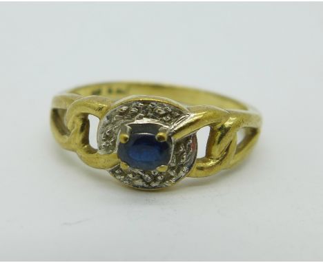 A 9ct gold and blue stone ring, 2.7g, Q