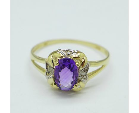 A 9ct gold, amethyst and small diamond ring, 1.1g, O