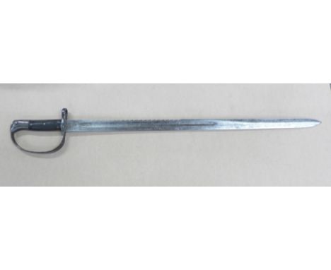 A Victorian sword with saw back, the blade marked 35W and WD with broad arrow, no scabbard