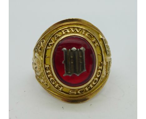 A 10k gold American graduation ring set with red stone from Warwick High School, 1960, 11.7g, T