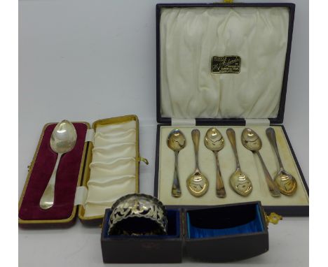 A cased set of six silver teaspoons, one other silver spoon and a silver napkin ring, 114g