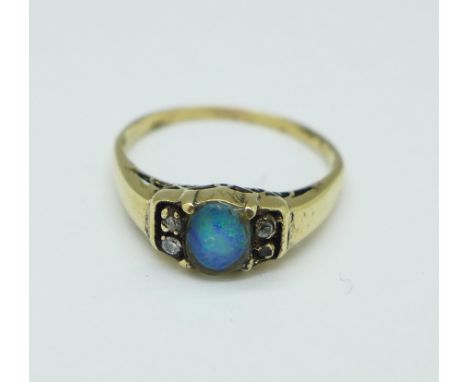 A 14ct gold, opal and white stone ring, 2.4g, P