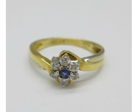 An 18ct gold, sapphire and diamond cluster ring, 3g, K