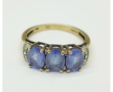 A 9ct gold and three blue stone ring, 3g, N, stones a/f