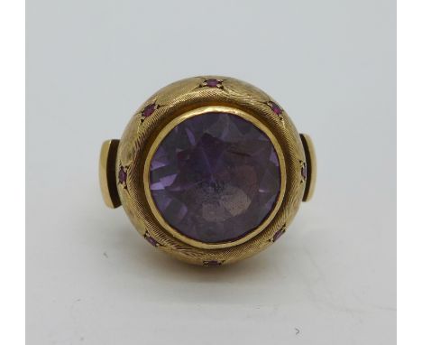 A 9ct gold purple stone and ruby ring, 11.3g, Q