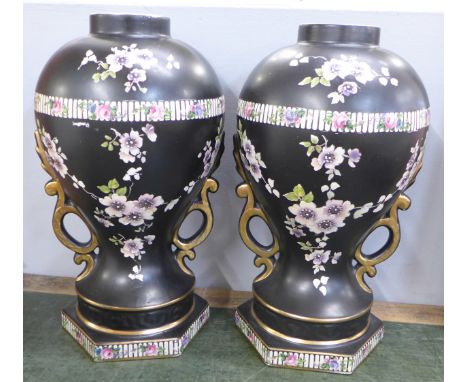 A pair of black enamel decorated vases, 39cm