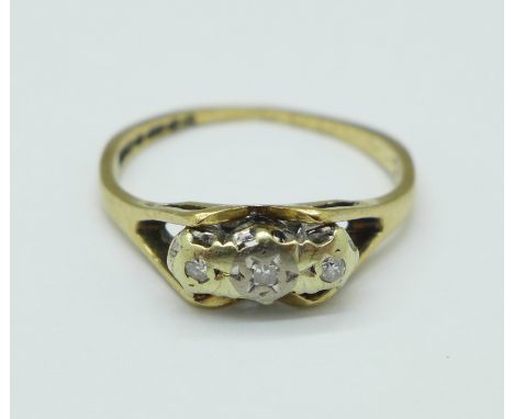 A 9ct gold and three stone diamond ring, 2g, M