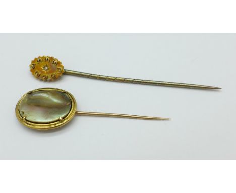 A 15ct gold and diamond set stick pin and a blister pearl set stick pin, pearl pin a/f