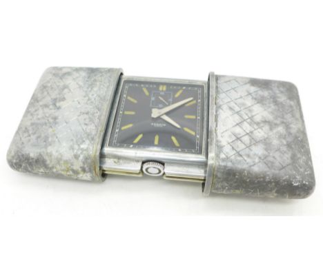 A Movado Ermeto 8-day large travel clock with black dial