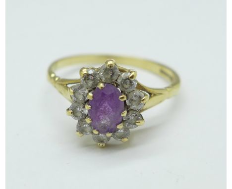 A 9ct gold, amethyst and white stone ring, 2.6g, M