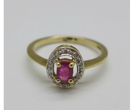 A 9ct gold, diamond and ruby cluster ring, 1.6g, L