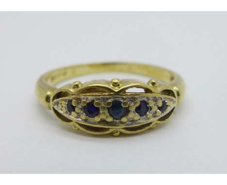 A 9ct gold and five stone sapphire ring, 2.5g, Q