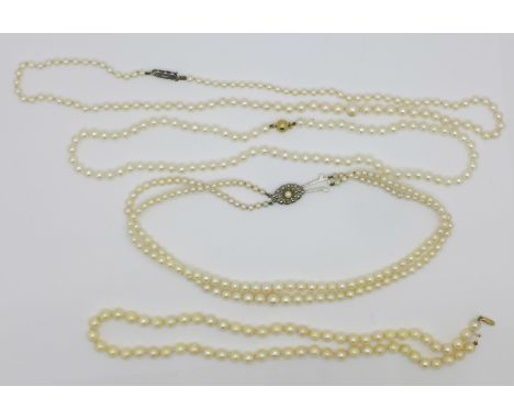 Four cultured pearl necklaces