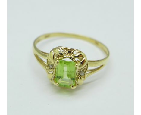 A 9ct gold, peridot and small diamond ring, 1.1g, O