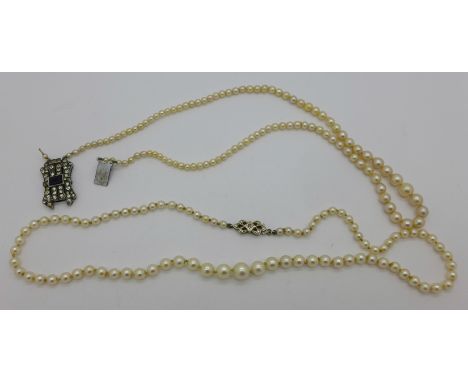 Two cultured pearl necklaces, one with 9ct white gold clasp and set with an old cut diamond, the other a/f