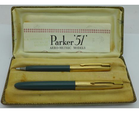 A Parker 51 pen and pencil set with instruction leaflet