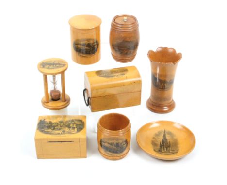 Mauchline ware _ eight pieces comprising a cylinder form box, (Rothesay Castle, Exterior) 7cm, a dome top box with ïropeÍ han