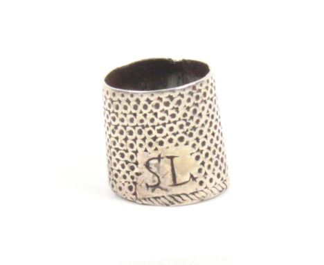 An 18th Century English silver sewing ring for a child initialled SL                                 (From the collection of 