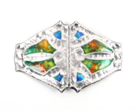 An enamel and silver buckle, Liberty and Co, Cymric, in two halves, each with four panels of mixed colour enamel with ïhammer