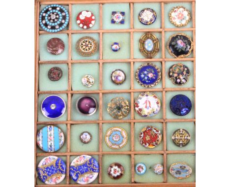 A collection of thirty seven buttons, late 19th Century/ early 20th Century comprising floral and figural enamel examples, a 