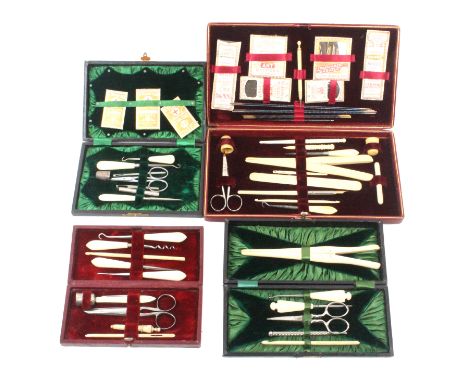 Four late 19th Century small format sewing companions all of rectangular form in leather or leatherette, all with a selection