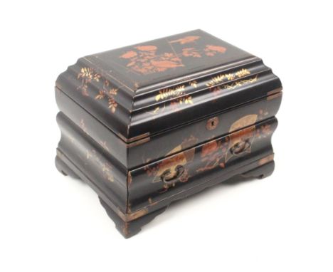 A late 19th Century Japanese black ground lacquer sewing box of bombe form decorated with birds, flowering branches and other