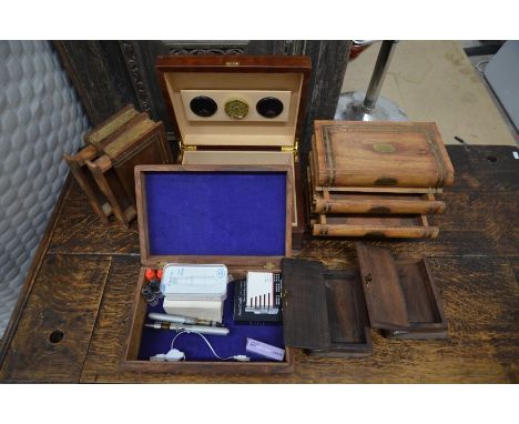 A French Credo cigar humidor to/w a carved box containing e-cigarette vapours etc and a collection of a wooden trinket boxes 