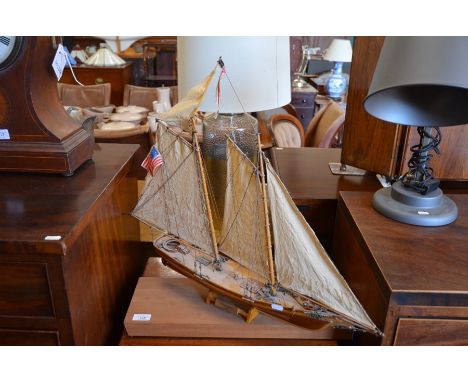 A fully-rigged model yacht - 'America 1851', 55 cm tall