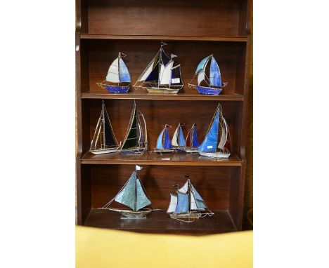 A collection of eleven stained glass model/paperweight yachts