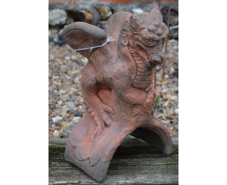 A cast terracotta small dragon ridge tile