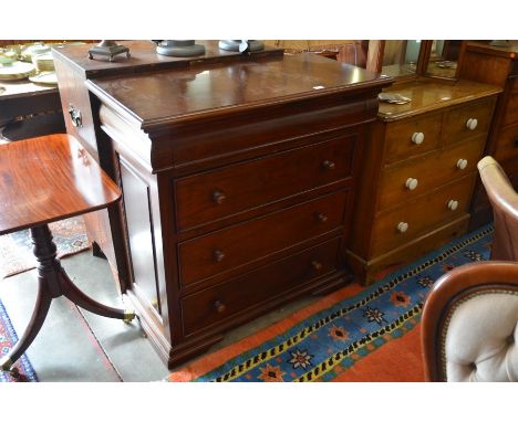 A reproduction mahogany chest with cushion moulded cavetto drawer over three standard drawers with turned handles, raised on 