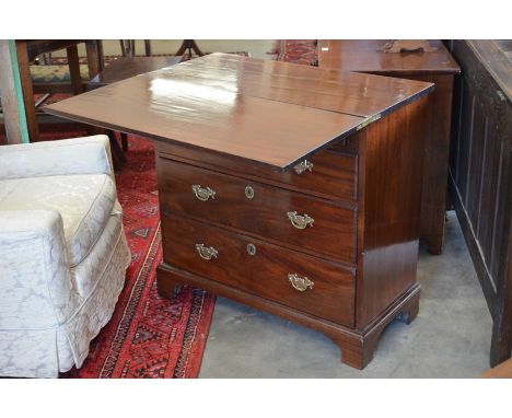 An 18th century mahogany bachelor's chest with folding top over two short and three long graduating drawers with brass handle