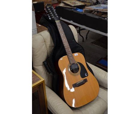 A Gibson Epiphone model: PR100 12NA electro-acoustic twelve-string guitar with Stagg soft case