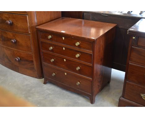 A small 19th century chest of four long graduating drawers with ivory escutcheons raised on splayed bracket feet, 65.5 cm&nbs