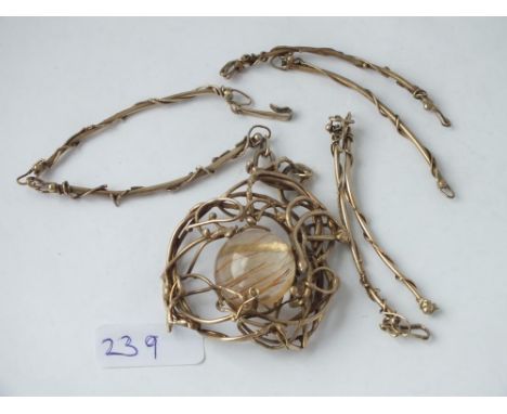 A contemporary silver gilt necklace set with reconstituted quartz 