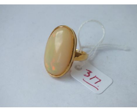 Large oval opal set in 18ct gold – size L/M - 8.5gms   
