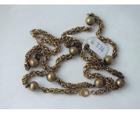 A good quality silver gilt necklace and matching bracelet – 67gms 