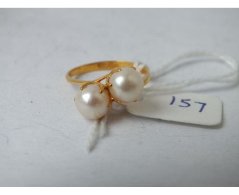 A two stone pearl cross over ring set in 22ct, size M/N   