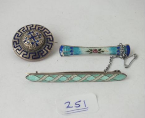 Three antique silver and enamel brooches    