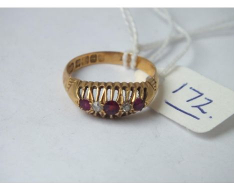 A five stone ruby and diamond claw set ring in 18ct, size O  