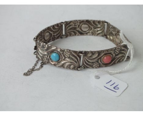 A sterling silver link bracelet inset with turquoise etc.,   
