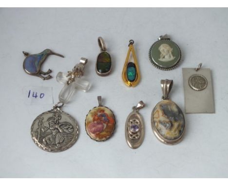 Ten various silver pendants, some inset with stones etc.,   
