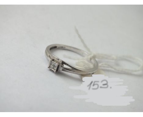 A diamond ring set inn silver, size Q     