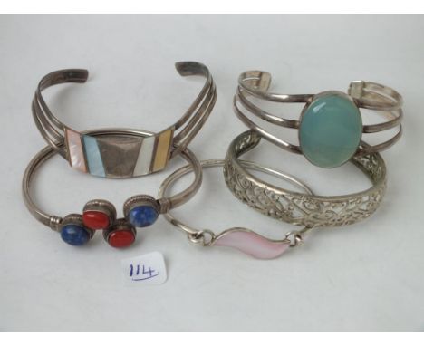 Five various silver bangles, some stone inset    
