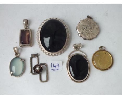 A silver gilt coin fob, brooches, lockets etc.,    