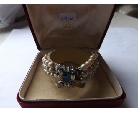 Triple row pearl bracelet with fancy silver clasp &amp; box