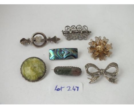 Seven various silver brooches      