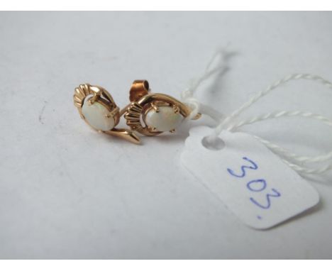 Pair of oval opal set earrings       
